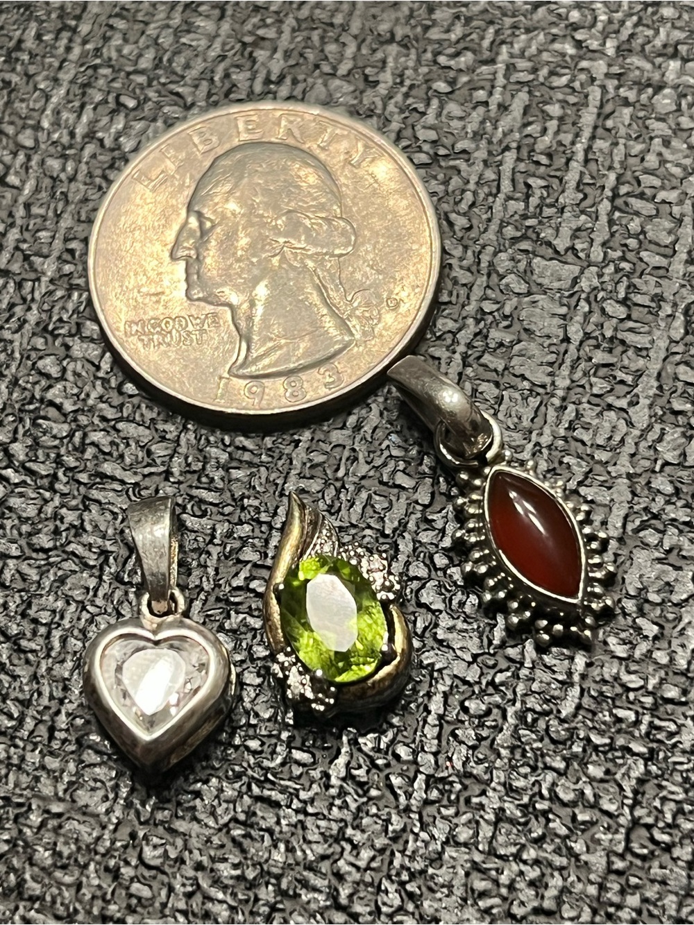 Three 925 pendants